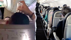 Passenger's bizarre use of drinking glass on flight leaves travelers horrified Insurance Yet